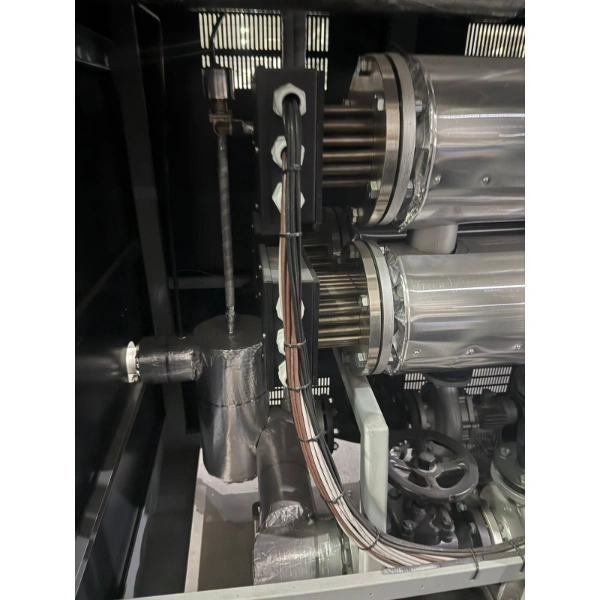 Circulation pump, insulated oil lines, and heater assembly inside an AODE thermal oil heating system