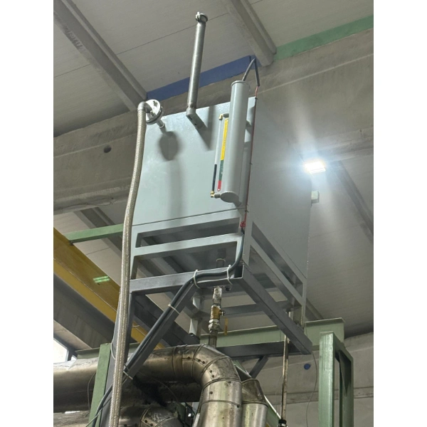 Elevated thermal oil tank installed above the calendering line to accommodate oil expansion and support circulation