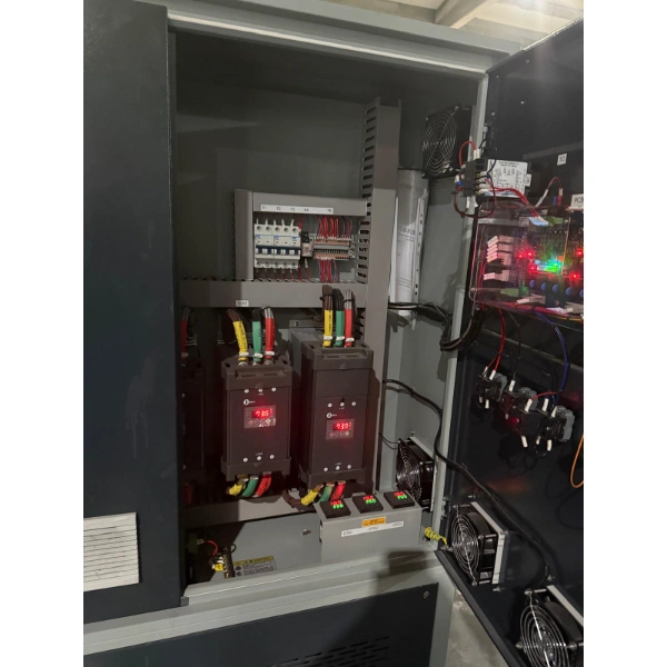 Electrical control cabinet of the dual-circuit thermal oil heating system with solid state relays and temperature controllers
